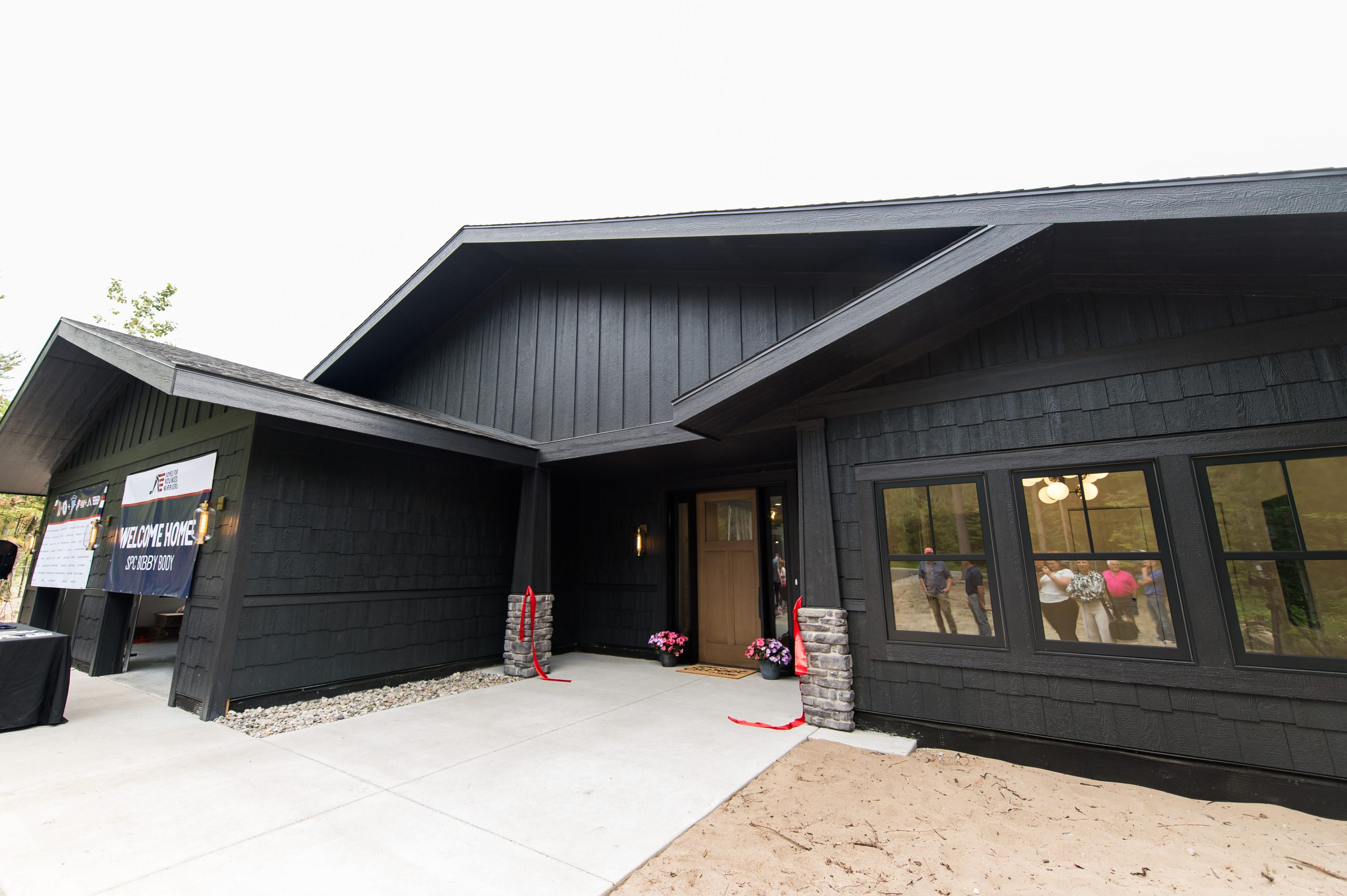 Spence Brothers Helps Build Home for Local Wounded Warrior Spence